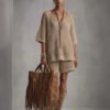 f74101fc-a21f-4878-8086-f3265d510d3f.jpg Wool Summer Loose-fit V-neck Short-sleeve Top And High-waisted Shorts Set